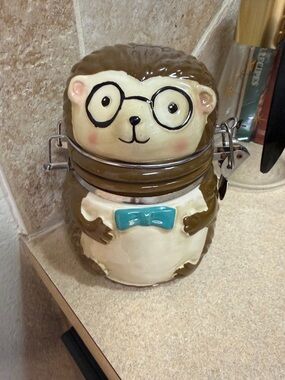 Boston Warehouse Cream and Brown Ceramic Hedgehog Jar with Teal Bow Accent